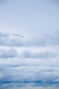 Blue sky background with tiny fluffy clouds. With copy space Royalty Free Stock Photo
