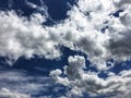 Blue sky background with white clouds and gray clouds Royalty Free Stock Photo