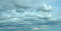 A blue sky backgrounds and textues with white clouds Royalty Free Stock Photo