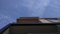 Blue Sky with beautiful clouds and front elevation of a contemporary residential house