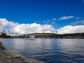 Blue sky big cloud shore zurich lake sunny day good weather wak along the shore of zurich lake with fountain the middle