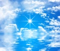 Blue sky with big clouds and shiny sun over water Royalty Free Stock Photo