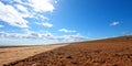 Blue sky and brown ground perspective Royalty Free Stock Photo