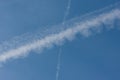 Blue sky with chemtrails or contrails Royalty Free Stock Photo