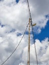 Electric pole on a sunny and cloudy day? Royalty Free Stock Photo