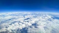 Blue sky, cloud covered earth