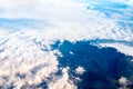 Blue sky and Cloud and mountain top view from airplane window,Nature background Royalty Free Stock Photo