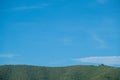 Blue sky and cloud with moutain and meadow tree Royalty Free Stock Photo