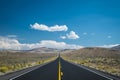 Blue sky and clouds above desert highway Royalty Free Stock Photo