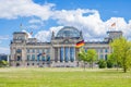 The German Federal Parliament (Reichstag) building in Berlin, with German flags Royalty Free Stock Photo