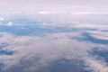 Blue sky and Clouds as seen through window of aircraft Royalty Free Stock Photo