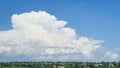 Blue sky with clouds, flying birds and green branches. Summer nature. Road. Royalty Free Stock Photo