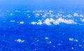 Blue sky and Clouds looking from the Airplane