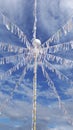 Blue sky clouds and a maypole