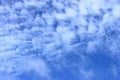 Blue sky with clouds - natural background. Cloud patterns in the sky Royalty Free Stock Photo