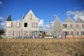 Blue sky with clouds and new houses under construction. Royalty Free Stock Photo