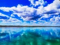 Blue sky with clouds over the river Royalty Free Stock Photo