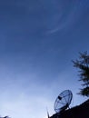 Blue sky and clouds over the satellite dish Royalty Free Stock Photo