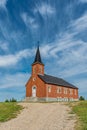 Blue sky and clouds over St. Johns Lutheran Church near Regina, SK Royalty Free Stock Photo