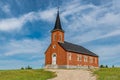 Blue sky and clouds over St. Johns Lutheran Church near Regina, SK Royalty Free Stock Photo