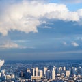 Blue sky with clouds over urban houses in Paris Royalty Free Stock Photo