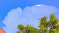 Blue sky with clouds and rainy clouds far away, Storm clouds gather over the town. Royalty Free Stock Photo