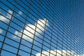 Blue sky with clouds reflections on modern glass business building Royalty Free Stock Photo