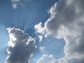 Blue sky clouds and sun rays