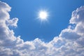 Blue sky with clouds and sun reflection.The sun shines bright in Royalty Free Stock Photo