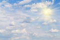 Blue sky with clouds and sun, sunlight, sun rays Royalty Free Stock Photo