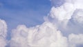 Blue sky with clouds timelapse. White big cloud on blue sky. a big and fluffy cumulonimbus cloud in the blue sky. Edge