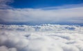 Blue sky and clouds - view from plane window Royalty Free Stock Photo