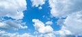 Blue sky, cloudscape background banner panorama , with clouds and sun Royalty Free Stock Photo