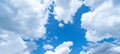 Blue sky, cloudscape background banner panorama , with clouds and sun Royalty Free Stock Photo