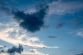 Blue sky and different color clouds in heart shape Royalty Free Stock Photo