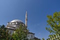 Blue sky domes and minarets, mosques in turkey, trees and minaret of a mosque Royalty Free Stock Photo
