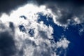 The blue sky dramatically turns into heavy black clouds. Royalty Free Stock Photo