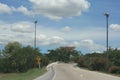 Blue sky and empty curved road Royalty Free Stock Photo