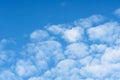 Blue sky filled with beautiful fluffy clouds Royalty Free Stock Photo