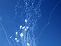 Blue sky with fireworks firecrackers white clouds