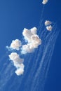 Blue sky with fireworks firecrackers white clouds