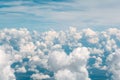 Blue sky with fluffy clouds. Aerial view from airplane window Royalty Free Stock Photo