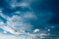 Blue Sky and Fluffy Clouds, Bright Cloudscape Background Royalty Free Stock Photo