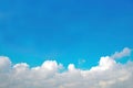 Blue sky fluffy white clouds on summer season bright clear skyline with beautiful cloudscape. Panorama blue sky clouds pattern on Royalty Free Stock Photo