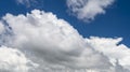 Blue sky fluffy white clouds on summer season bright clear skyline with beautiful cloudscape. Panorama blue sky clouds pattern on Royalty Free Stock Photo