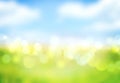 Blue sky green grass blurred bokeh background