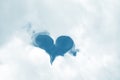 Blue sky in heart shape on white cloud nature background Royalty Free Stock Photo