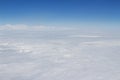blue sky high view from airplane clouds shapes Royalty Free Stock Photo