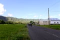 Blue sky, hills and road in the village.