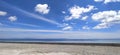 Blue sky horizone mudflat sea Royalty Free Stock Photo
